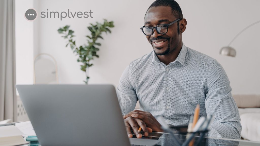 An African male working at his laptop