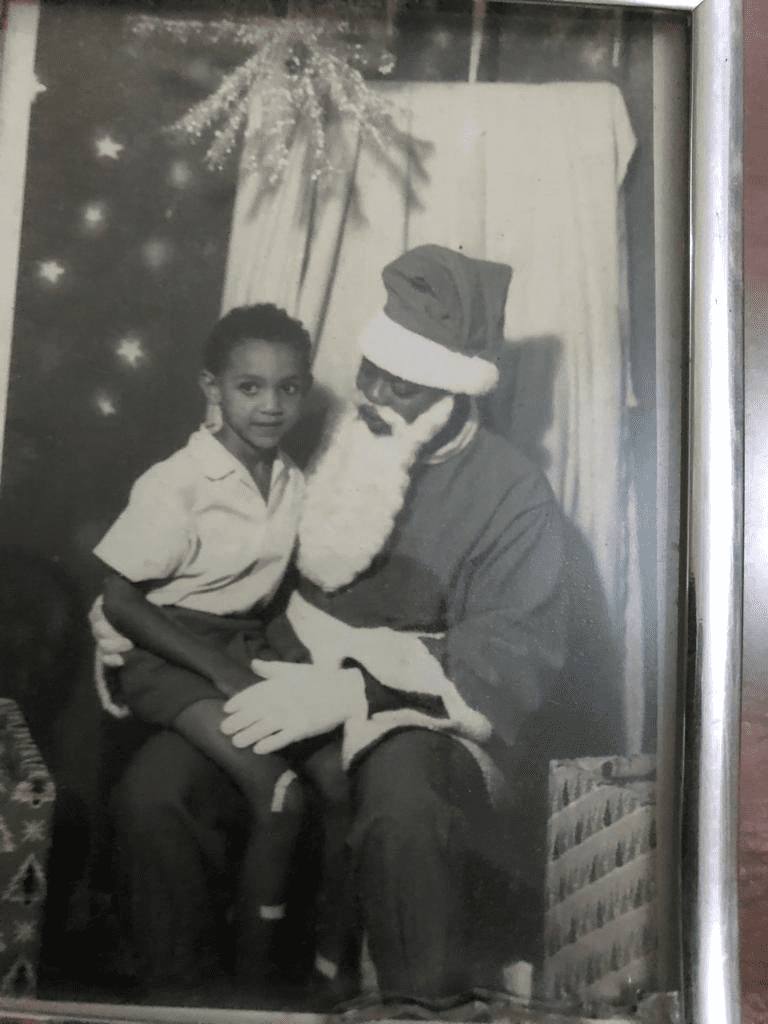 Olawunmi wasn’t capping. Here’s a picture of none other than Ben Murray-Bruce, founder of Silverbird Group with Santa at Kingsway Stores when he was 7.