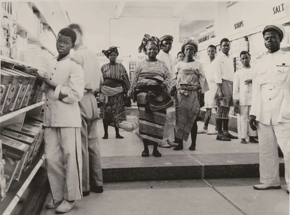 Customers and attendants at Kingsway Stores' provisions section (Lagos). Late 1940s