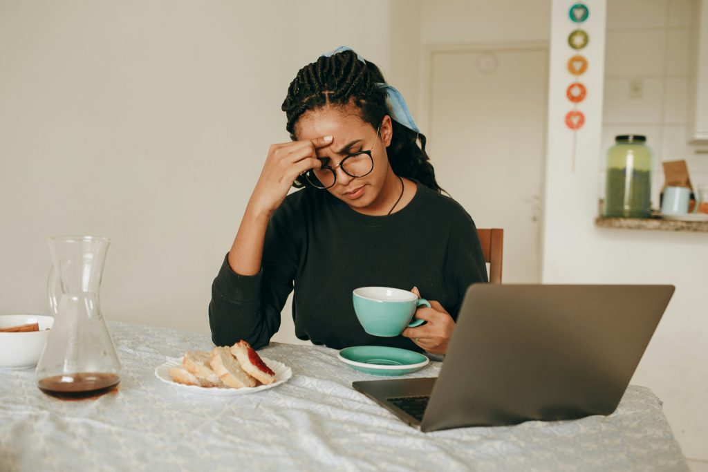 A woman thinking of time management techniques to develop